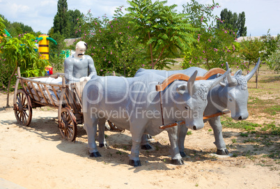 Monument to Cossack in a cart with the bulls