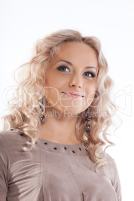 Happy blonde young woman with curly hair