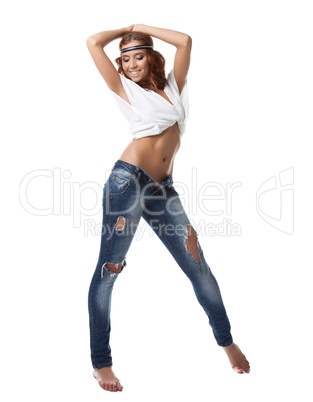 Smiling brunette woman in jeans