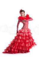Young woman in red dress performing flamenco