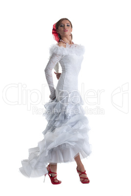 Pretty woman in white dress performing flamenco