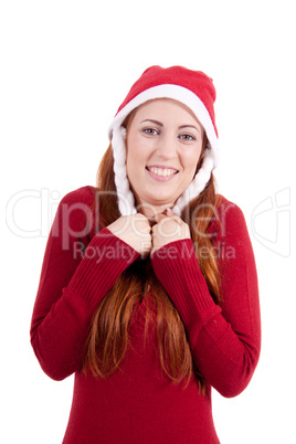Lachende Junge Frau zur Weihnachtszeit mit roter Nikolausmütze