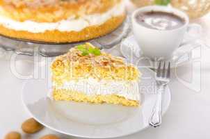 flat cake with an almond and sugar coating