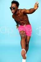 Causal african male in boxers having great time