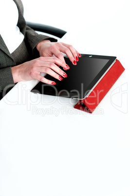 Cropped image of a businesswoman using tablet pc