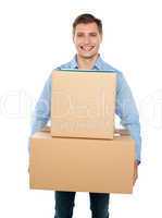 Young man holding cardboard boxes