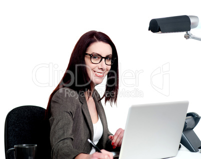 Portrait of corporate lady working in office