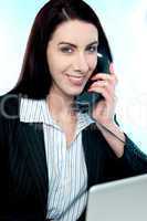 Woman communicating on phone