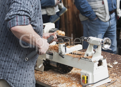 Man making wooden toy