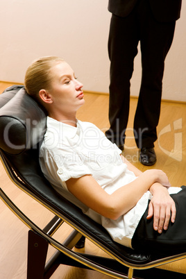 psychiatrist examining a female patient