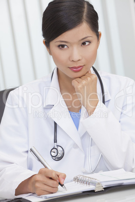 Chinese Female Woman Hospital Doctor Writing In Office