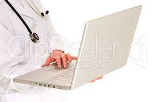 female doctor with stethoscope holding a laptop