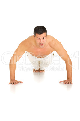 bare-chested man does push-ups