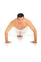 bare-chested man does push-ups