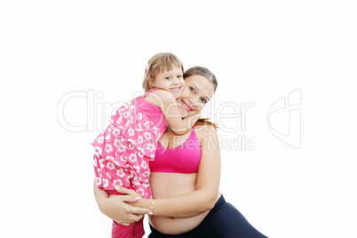 Beautiful pregnant woman with her daughter. Isolated on white ba