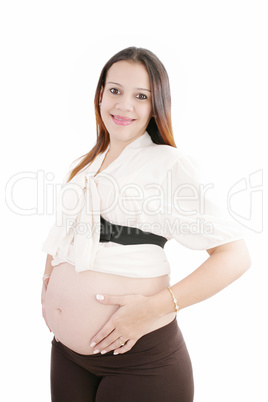 Pregnant happy woman hold her belly with hands looking at camera