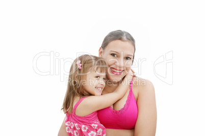 Portrait of Hispanic pregnant woman with daughter isolated over