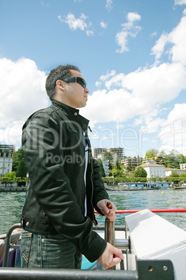 Man boating in Lugano Lake