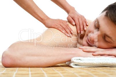 Handsome male getting spa massage