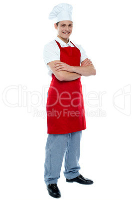 Full length shot of handsome smiling chef