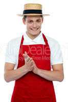 Young male chef wearing hat