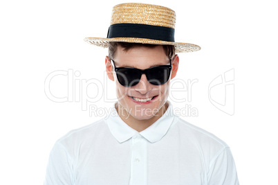 Closeup shot of smiling young man in hat