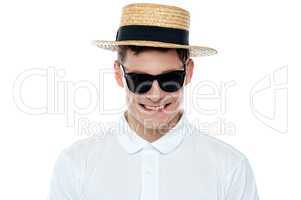 Closeup shot of smiling young man in hat