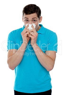 Young guy suffering from cold