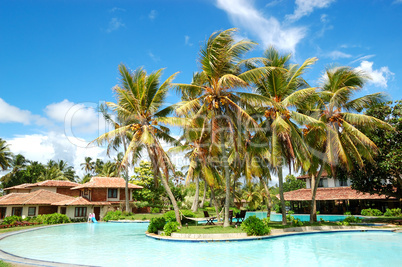 Swimming pool near villas at the popular hotel, Bentota, Sri Lan