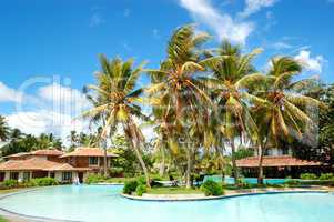 Swimming pool near villas at the popular hotel, Bentota, Sri Lan