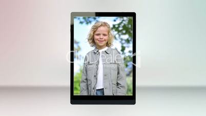 Video of a family in a park on tablet computer