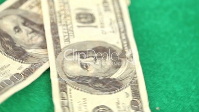 Dollar spinning on a gambling table