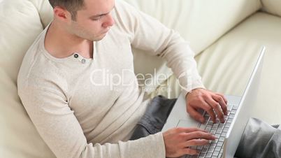 Man chatting on his laptop