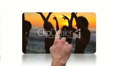 Finger scrolling screens which are showing beach videos