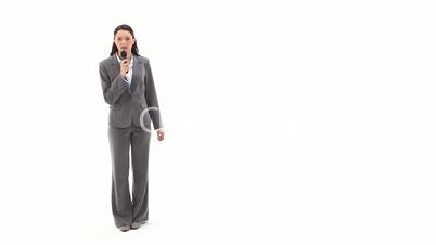 Business woman talking into a recorder device