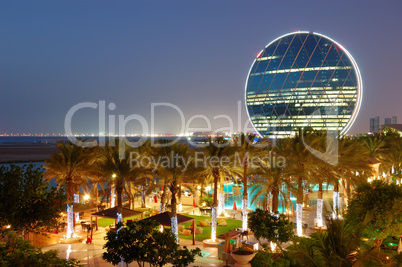 Night illumination in the luxury hotel and circular building, Ab