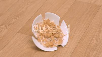 Bowl of cereals in super slow motion breaking