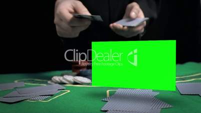Man throwing cards on the table