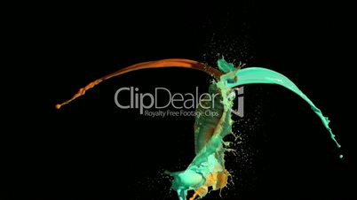 Colorful paints in slow motion mixing