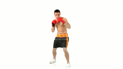 Sportsman boxing with gloves