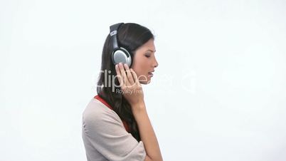 Woman listening while dancing