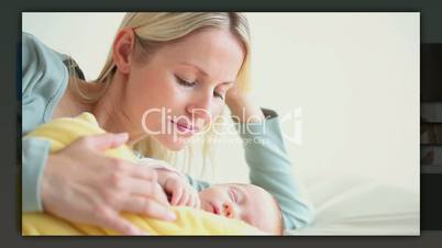 Blonde woman taking care of her cute baby