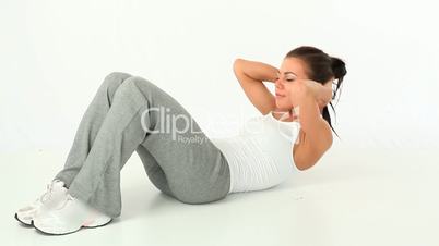 Sportswoman doing abs