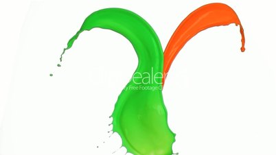 Orange and green sprays in slow motion mixing