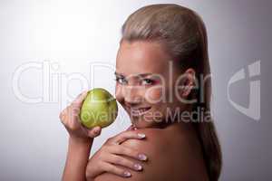 Pretty woman with green apple