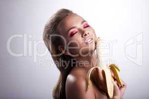 sexy girl posing with long banana