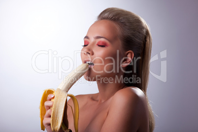 sexy girl eat long banana with desire