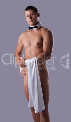 athletic man like striptease waiter hold towel