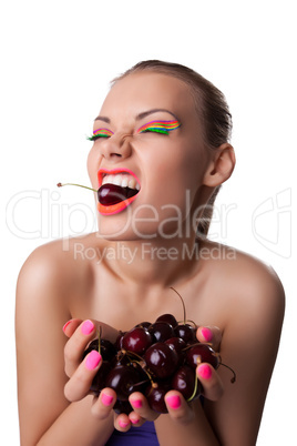 Funny girl eat ripe cherry isolated