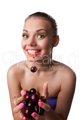 Smile funny woman eat one of two ripe cherry